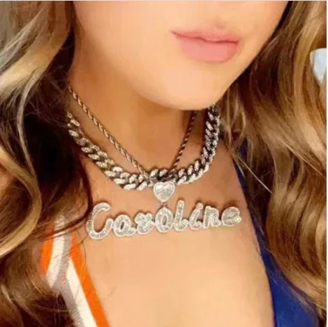 The Y2K Script Nameplate Blueprint: What Makes a Cursive Name Pendant Actually Look Iced Out