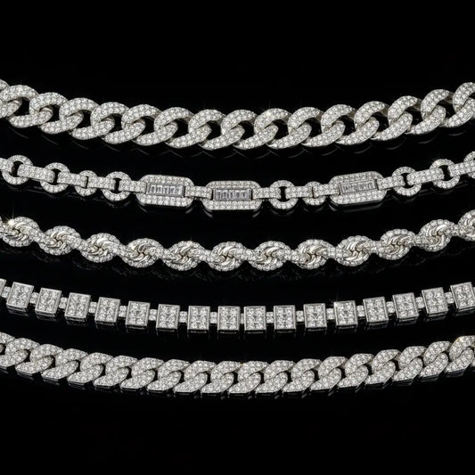 Five iced out silver chain types side by side on black background — Cuban, Figaro, Rope, Box and Franco link styles